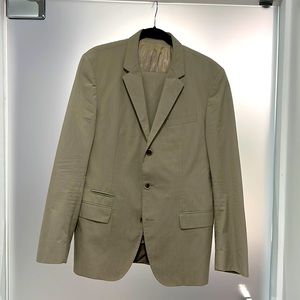 Classic three buttons suit by Hugo Boss. Very good condition.